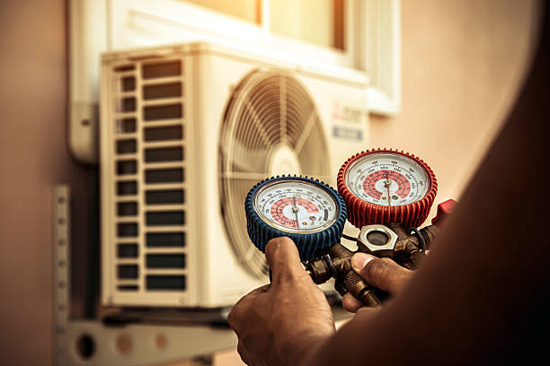 Professional Air Conditioning Service technician working in Zachary, LA